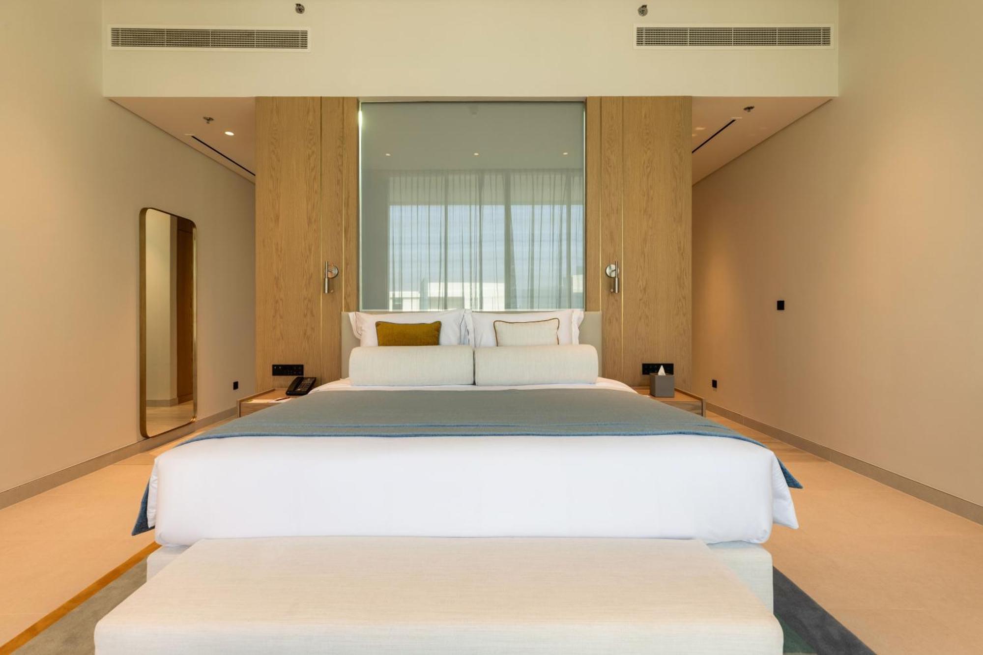 Ajman Hotel & Villas By Blazon Hotels Bagian luar foto A bedroom at the hotel