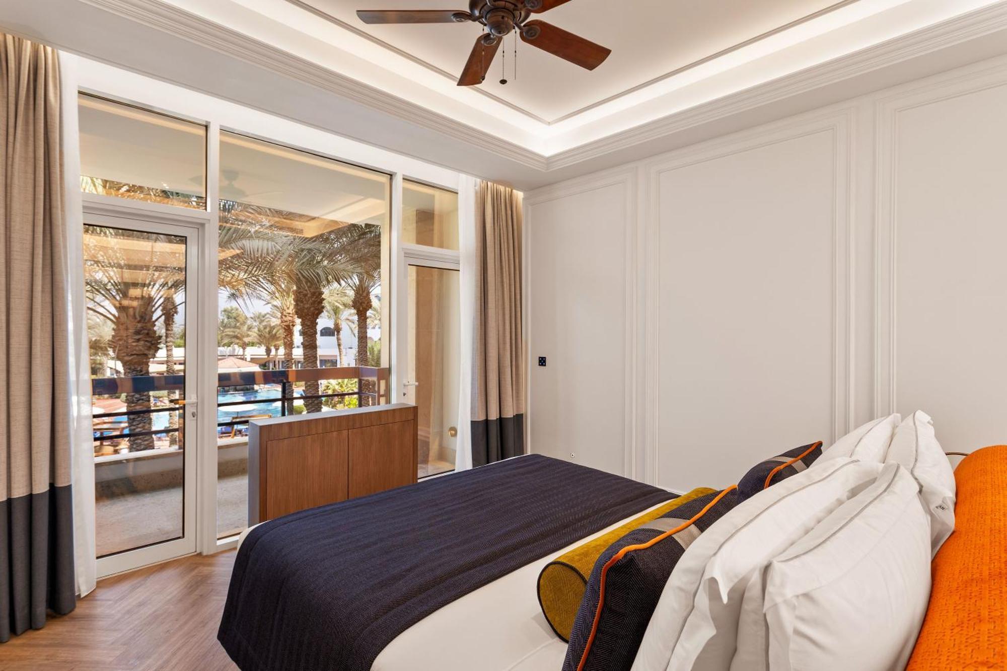 Ajman Hotel & Villas By Blazon Hotels Bagian luar foto A bedroom at the hotel